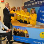 Andrew Morgan officially opens the new volunteers desk
