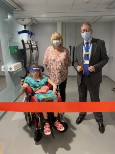 ULHT Chief Executive, Andrew Morgan, with Alisha Scowen and her mum Helen officially opening the new Changing Places facility at Pilgrim Hospital, Boston