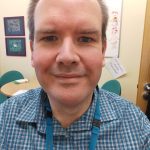 A photo of a man smiling