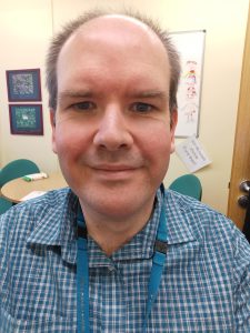 A photo of a man smiling